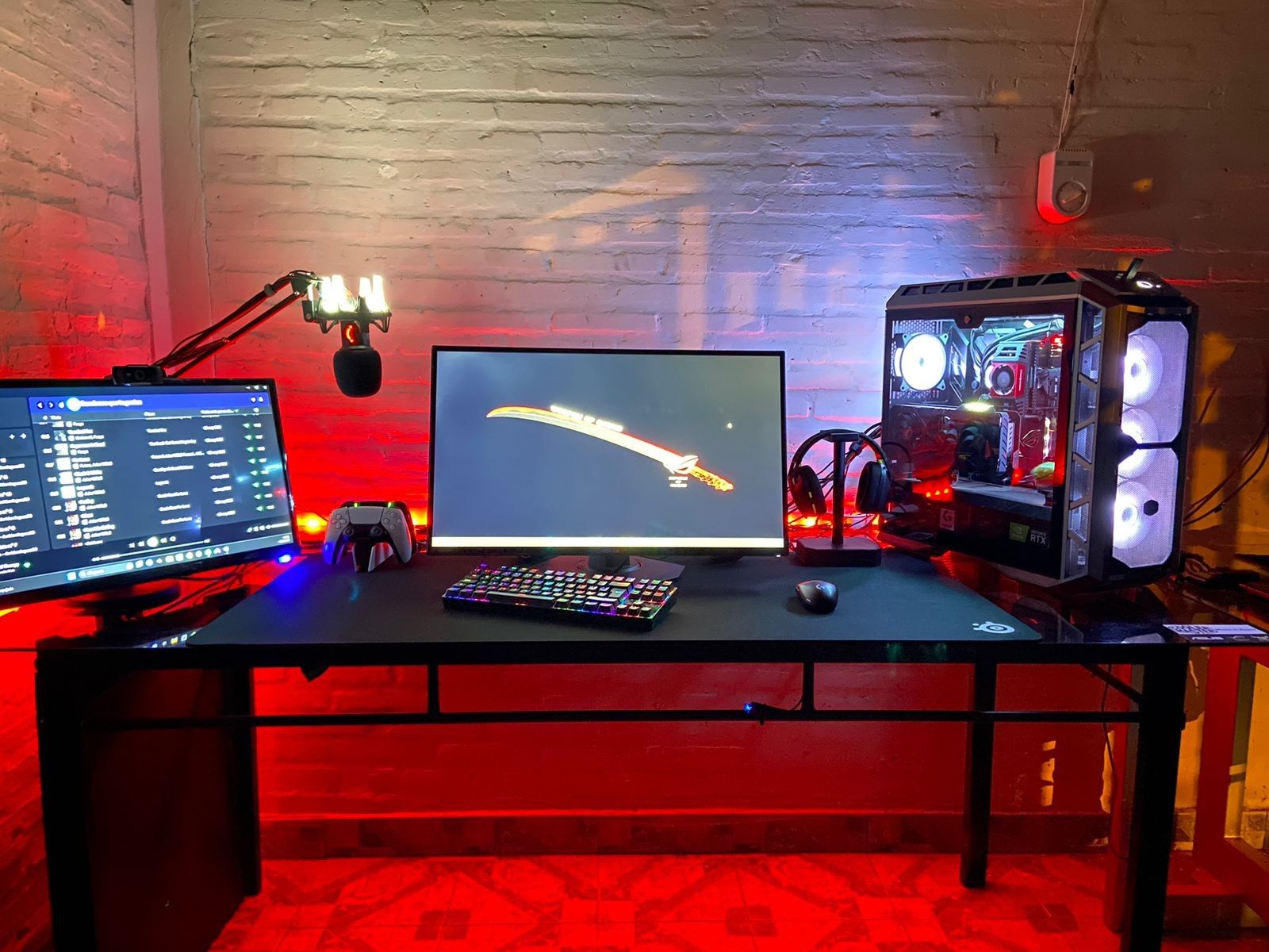 Dedicated gaming workspace setup with triple monitors